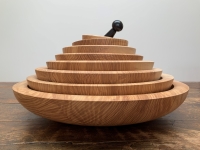 Nest of 8 bowls and mortar