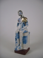 Seated female nude on plinth 2